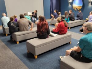 Local author, Chase Pagel, reads her book to a crowd