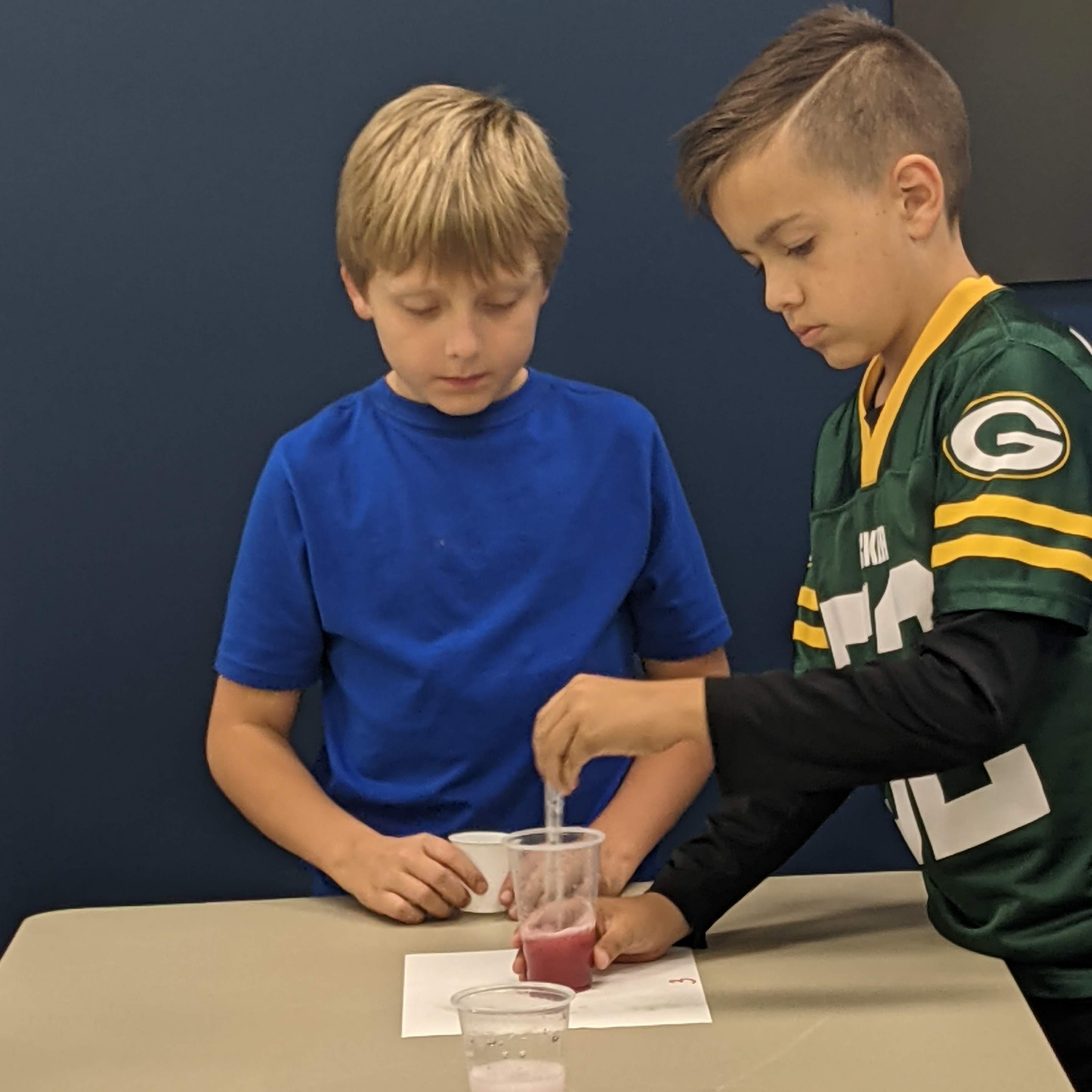 Two students participating in a STEM lab